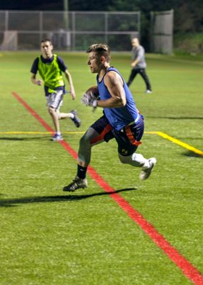 Student playing flag football at WVU Potomac State College